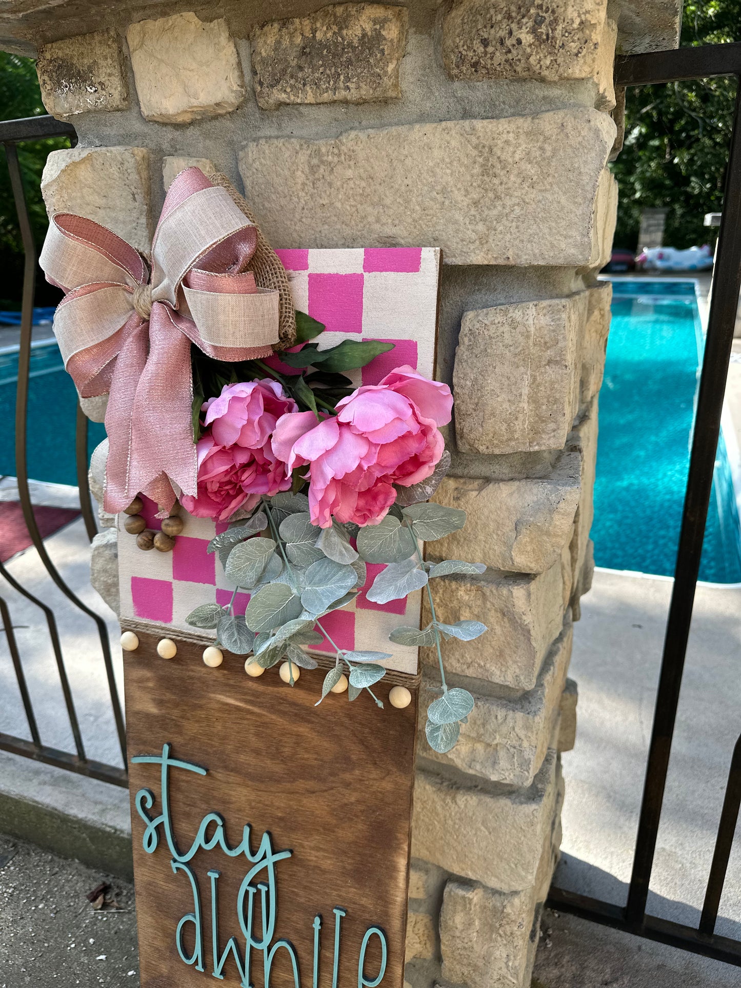 Stay Awhile Checkered Porch Leaner